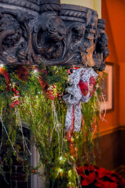 Christmas garland on a historic fireplace