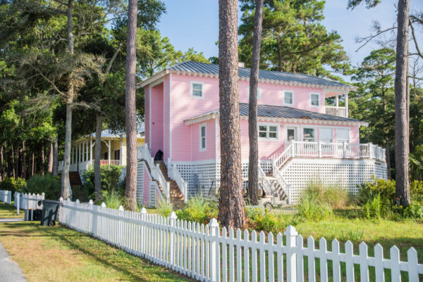Light pink beach house with white picket fence on Daufuskie Island