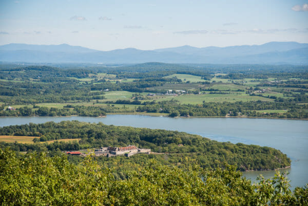 View of Fort Ticonderoga and Lake Champlain surrounded by trees