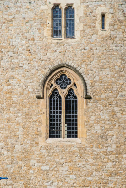 Stone tower with decorative arched windows