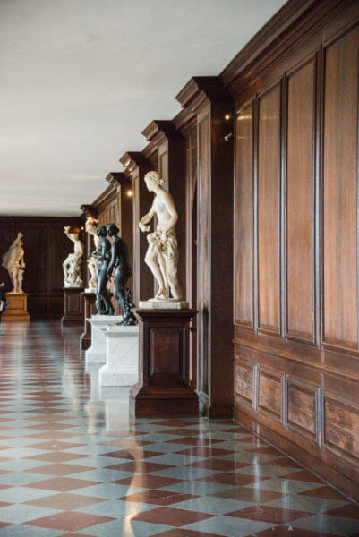 Statues in a hallway at Hampton Court