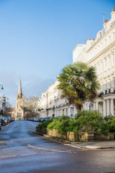 White townhouses and a stone church in Notting Hill