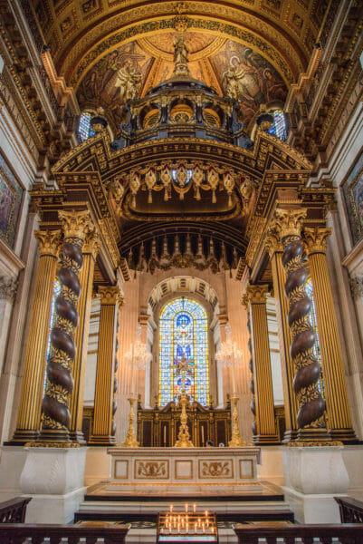 Gold altar and stained glass windows in St. Paul's Cathedral