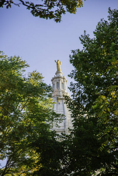 Gold statue on top of Capitol building in Madison