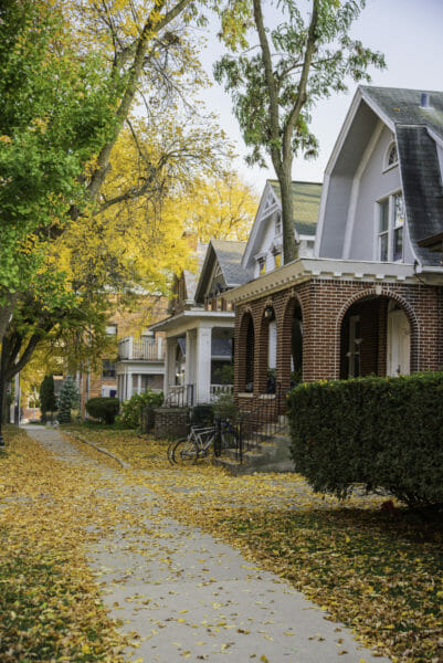 Historic houses with trees with yellow leaves in Madison