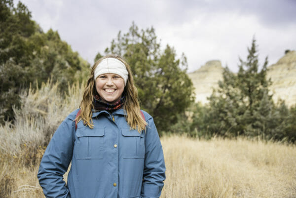 Woman in blue coat at Theodore Roosevelt National Park