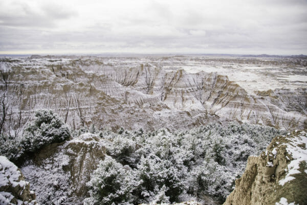 Hills in Badlands National Park covered in snow