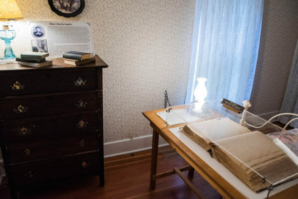 Laura Ingalls Wilder room with old Bible and dresser